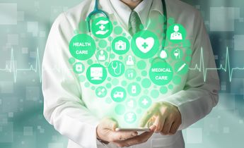 Medical Healthcare Concept - Doctor in hospital with digital medical icons graphic banner showing symbol of medicine, medical care people, emergency service network, doctor data of patient health.